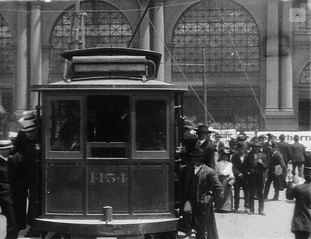 1906 San Francisco Earthquake - a new streetcar in front of the SF Ferry Building