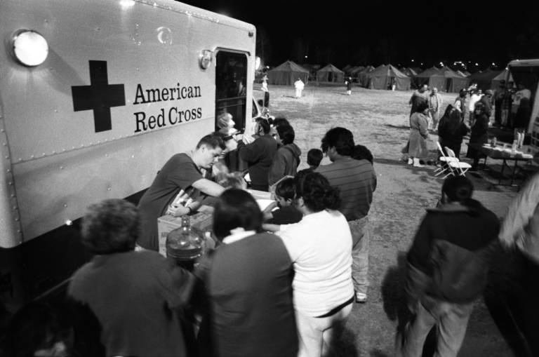American Red Cross handing out food, water, and aid in 1994
